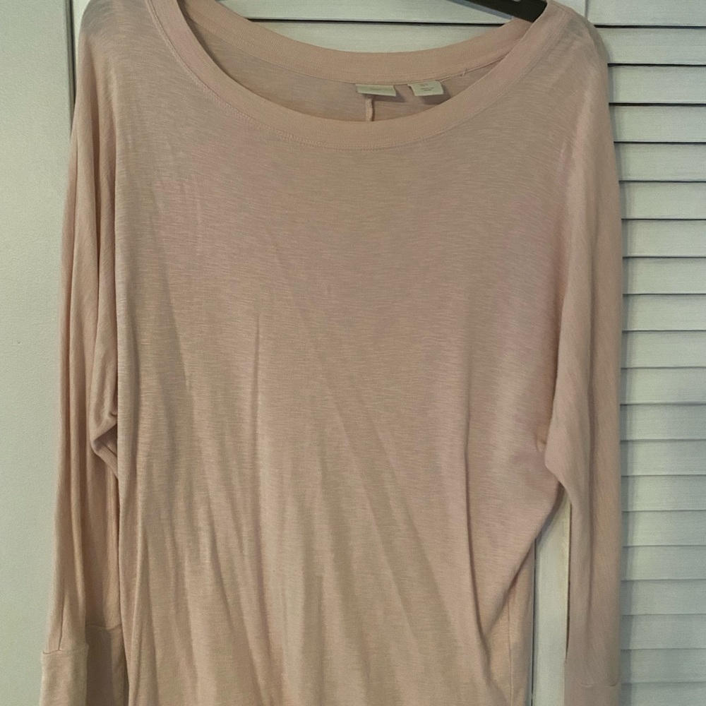 Light pink, soft blouse. Light wear